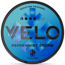 VELO Peppermint Storm nicotine pouches can with black rim, icy blue storm design, intense cooling peppermint flavor, tobacco-free smokeless nicotine pouch packaging