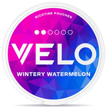 VELO Wintery Watermelon Mini nicotine pouches can with white rim, pink and blue geometric design, cool watermelon flavor, tobacco-free smokeless nicotine pouch packaging